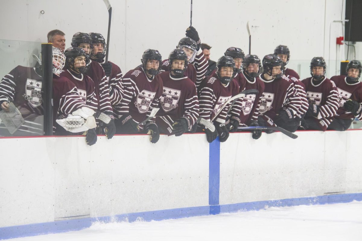 The Boys Prep team celebrates a goal in a 4-2 win over Upper Canada College wearing the program’s Alumni jersey. 
